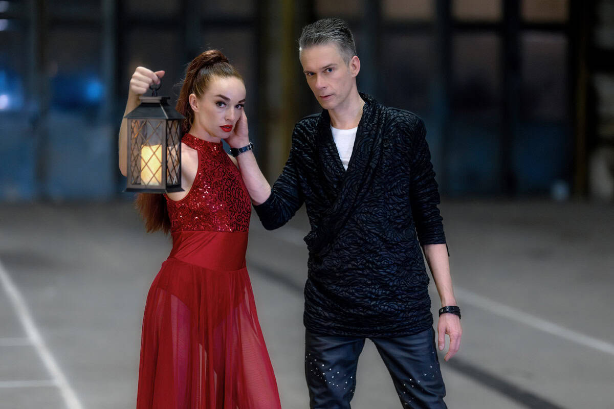 Magician and illusionist performing a magic trick with a lantern, captivating the audience with his.